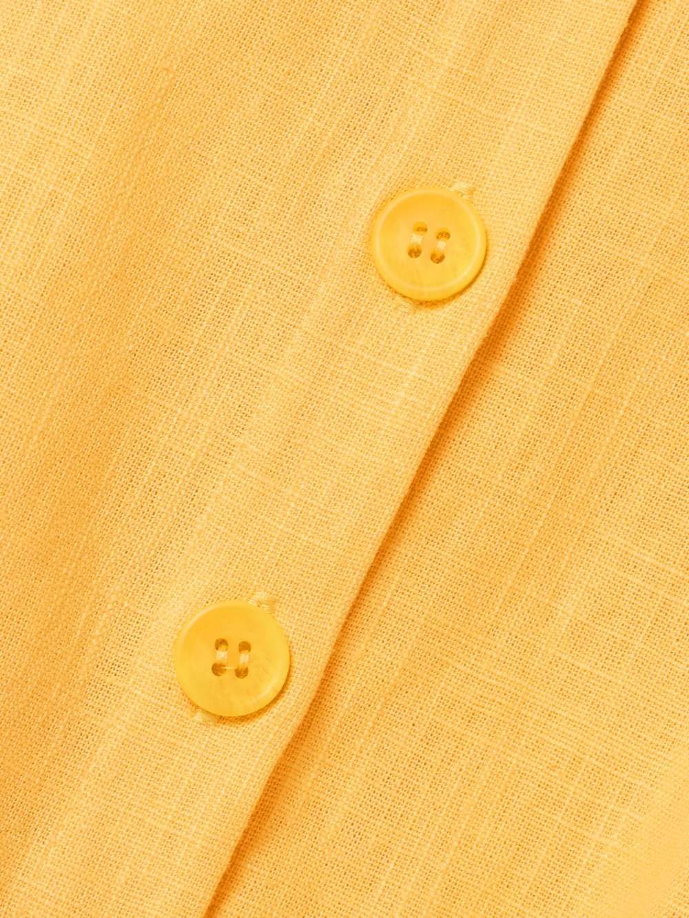 Close-up detail of the Tolu Coker Scalloped Ramie Midi Dress