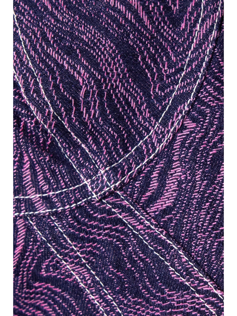 Close-up detail of the Tolu Coker + the Vanguard Strapless Denim-jacquard Bodysuit