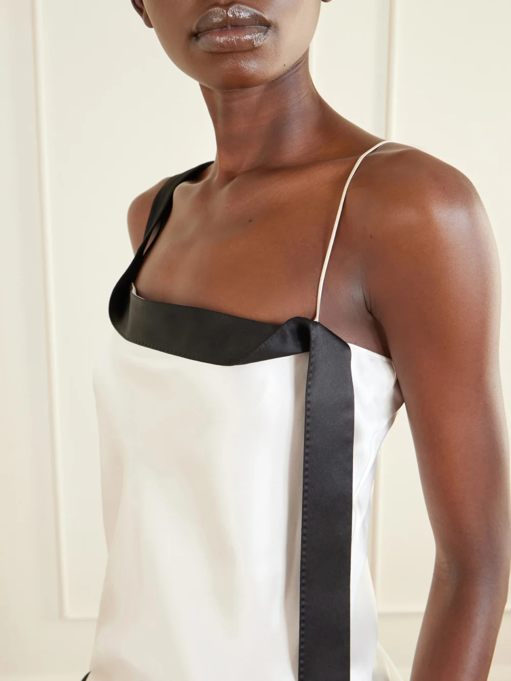 Close-up detail of the Tom Ford Asymmetric Draped Two-tone Silk-satin Camisole