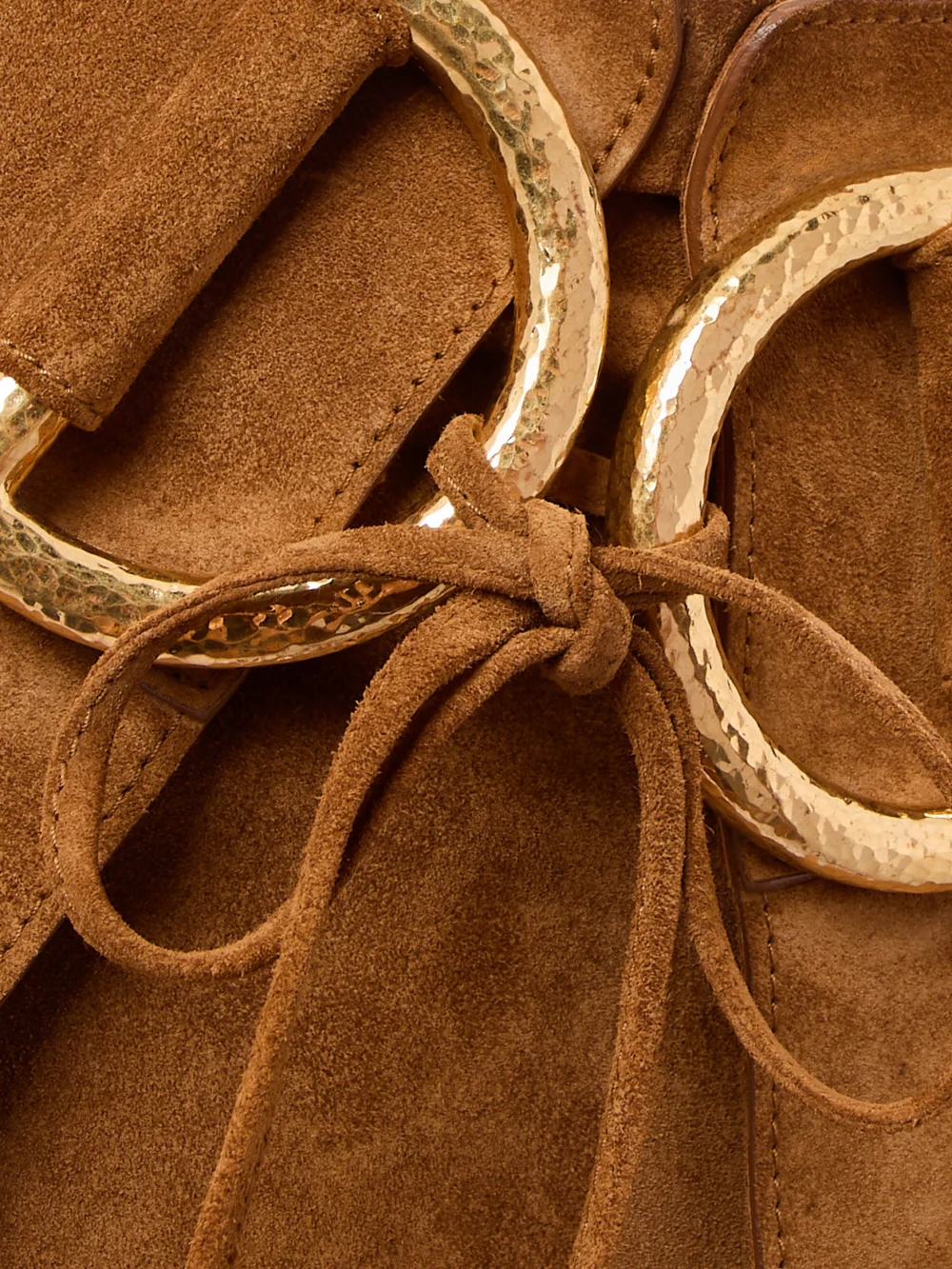Close-up detail of the Tom Ford Belted Layered Suede Mini Skirt