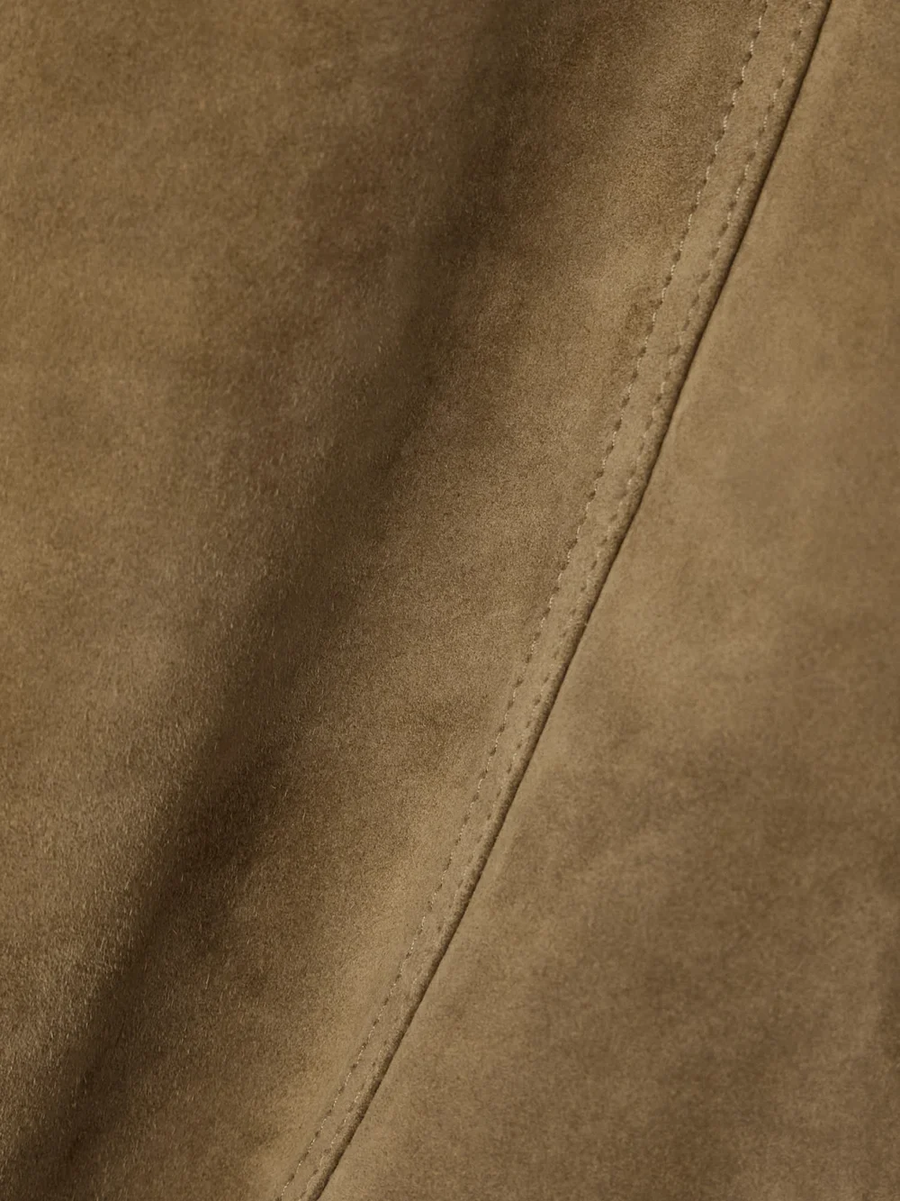 Close-up detail of the Tom Ford Belted Suede Skirt