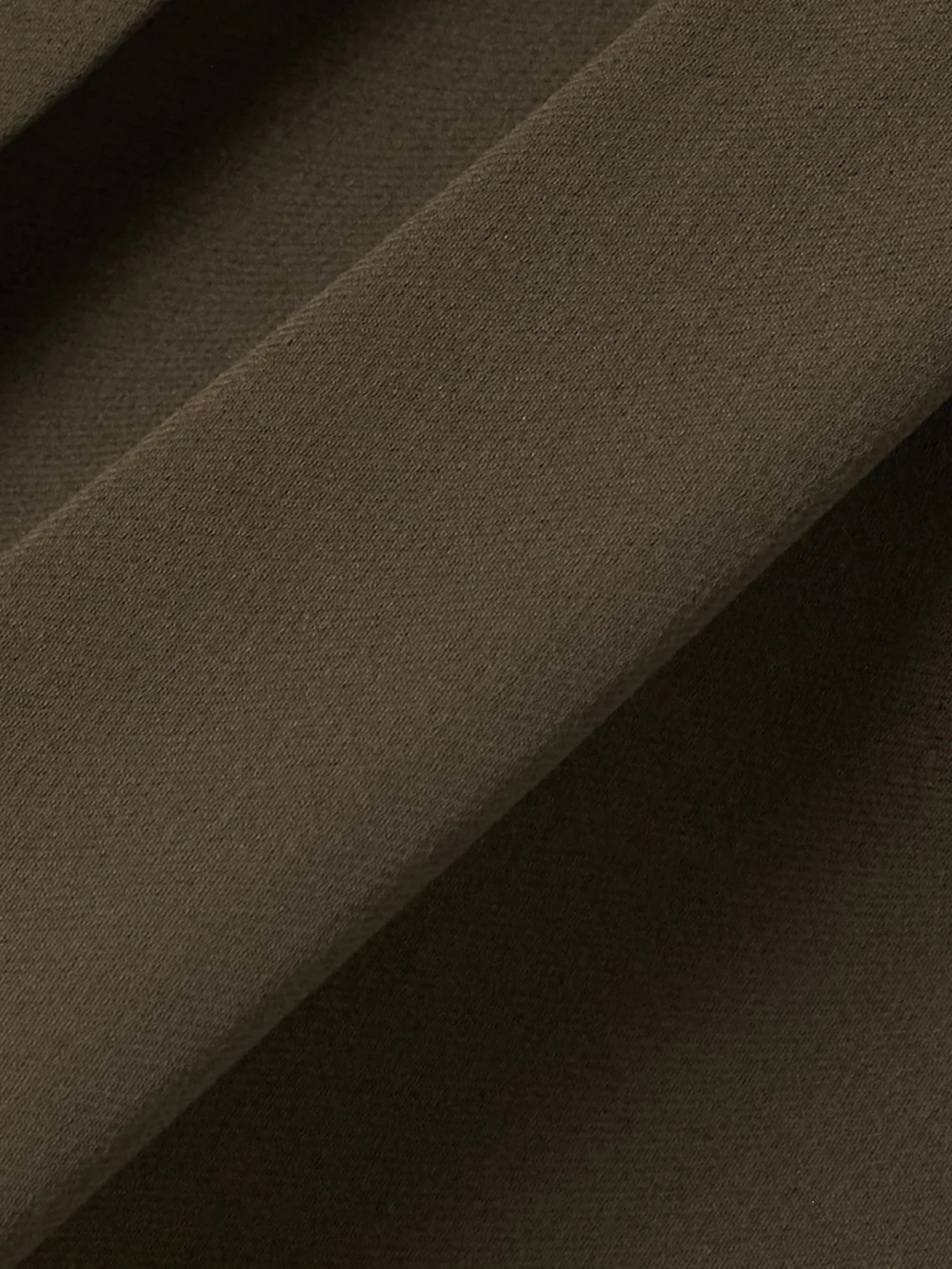 Close-up detail of the Tom Ford Cutout Draped Pleated Silk-georgette Blouse