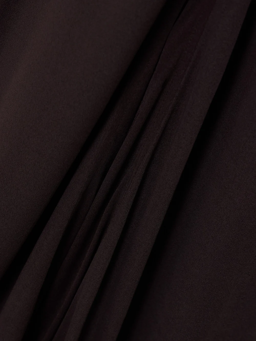 Close-up detail of the Tom Ford Cutout Gathered Jersey Halterneck Gown