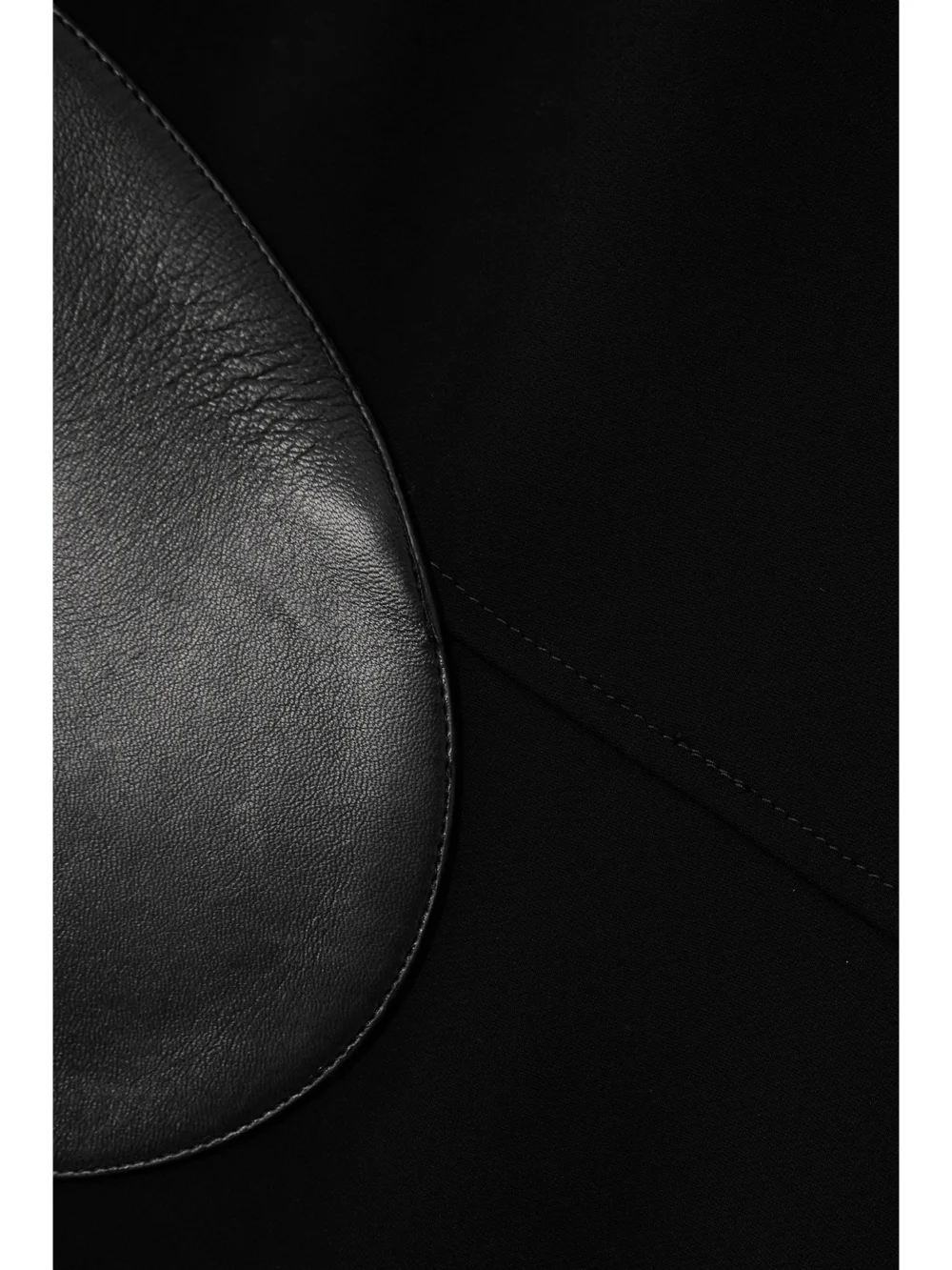 Close-up detail of the Tom Ford Cutout Leather-trimmed Crepe Gown