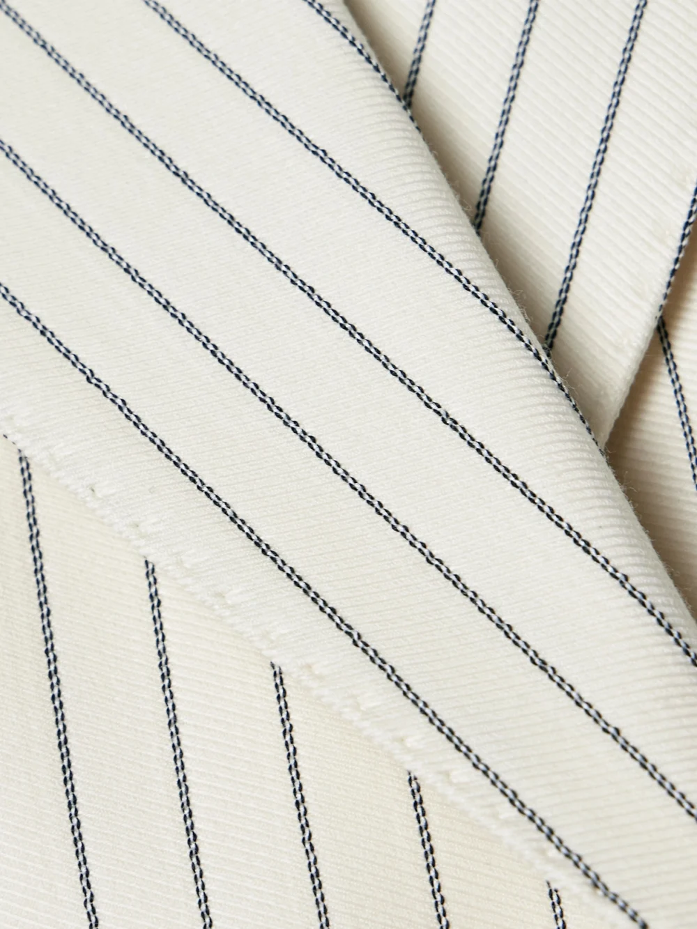 Close-up detail of the Tom Ford Double-breasted Pinstripe Wool-blend Twill Blazer
