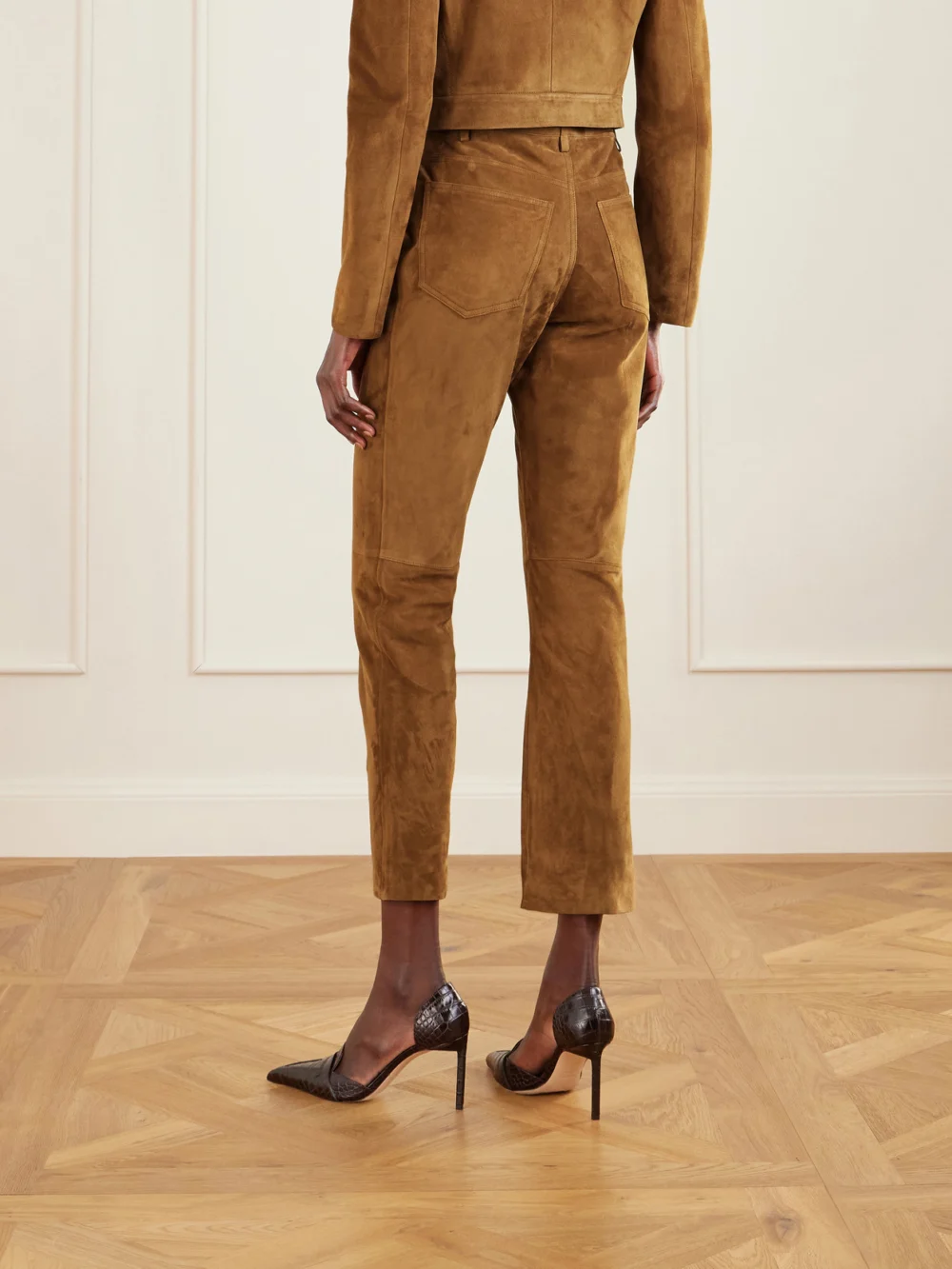 Back view of the Tom Ford Embellished Paneled Suede Straight-leg Pants