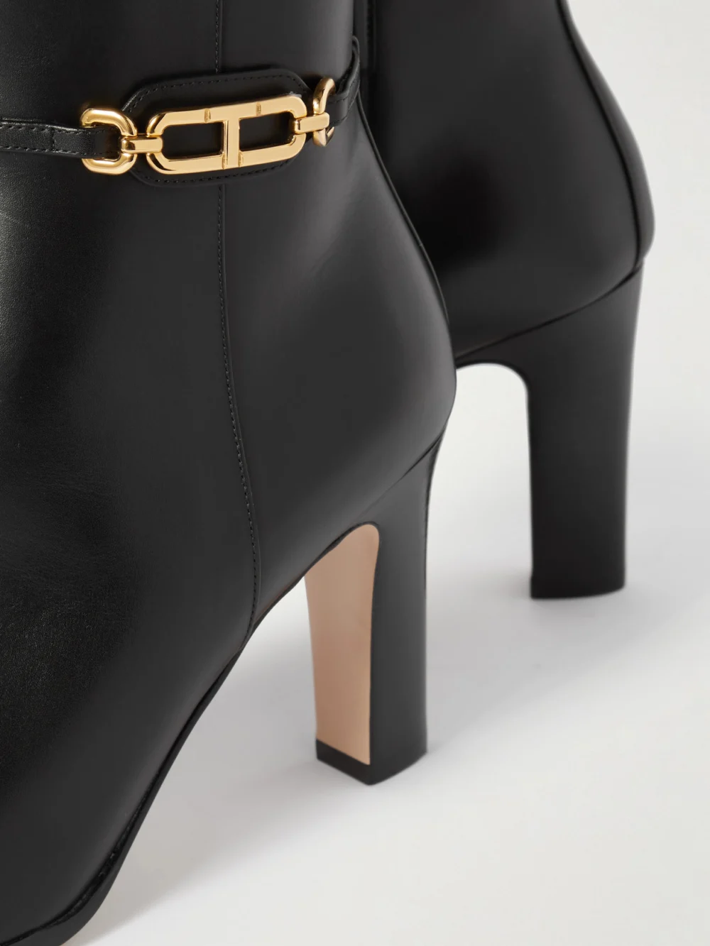 Close-up detail of the Tom Ford Embellished Patent-leather Boots