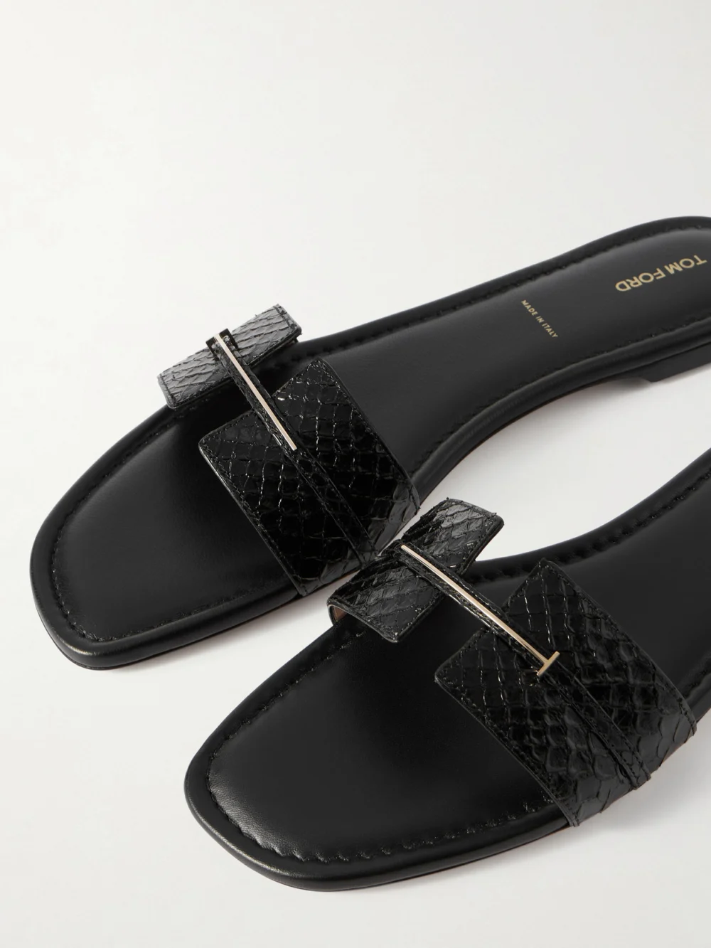 Close-up detail of the Tom Ford Embellished Snake-effect Leather Slides