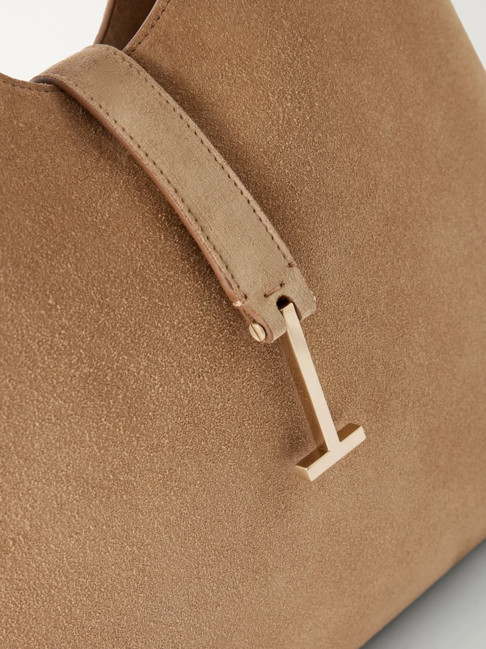 Close-up detail of the Tom Ford Kara T-embellished Medium Suede Shoulder Bag