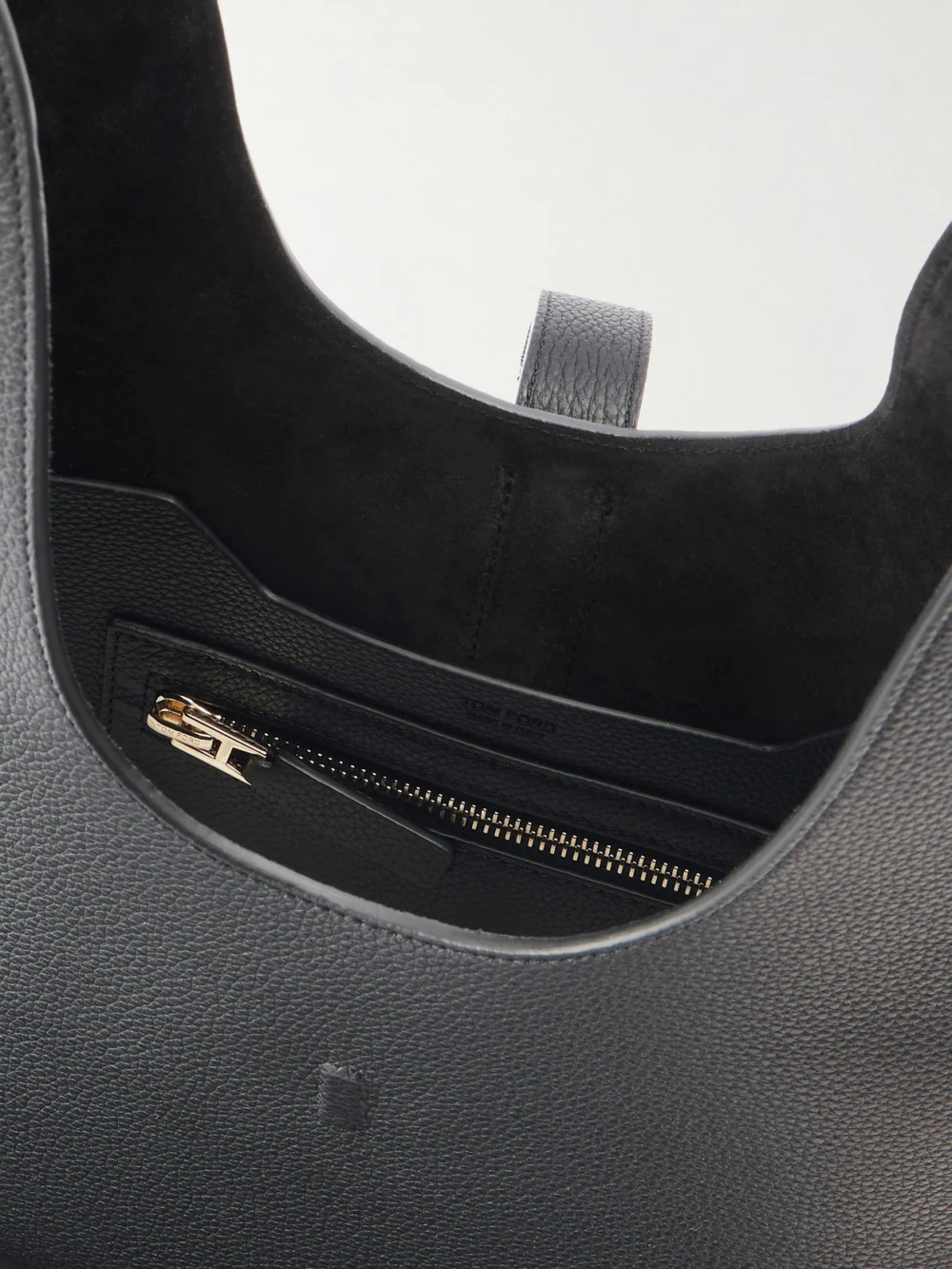 Close-up detail of the Tom Ford Kara T-embellished Medium Suede Shoulder Bag