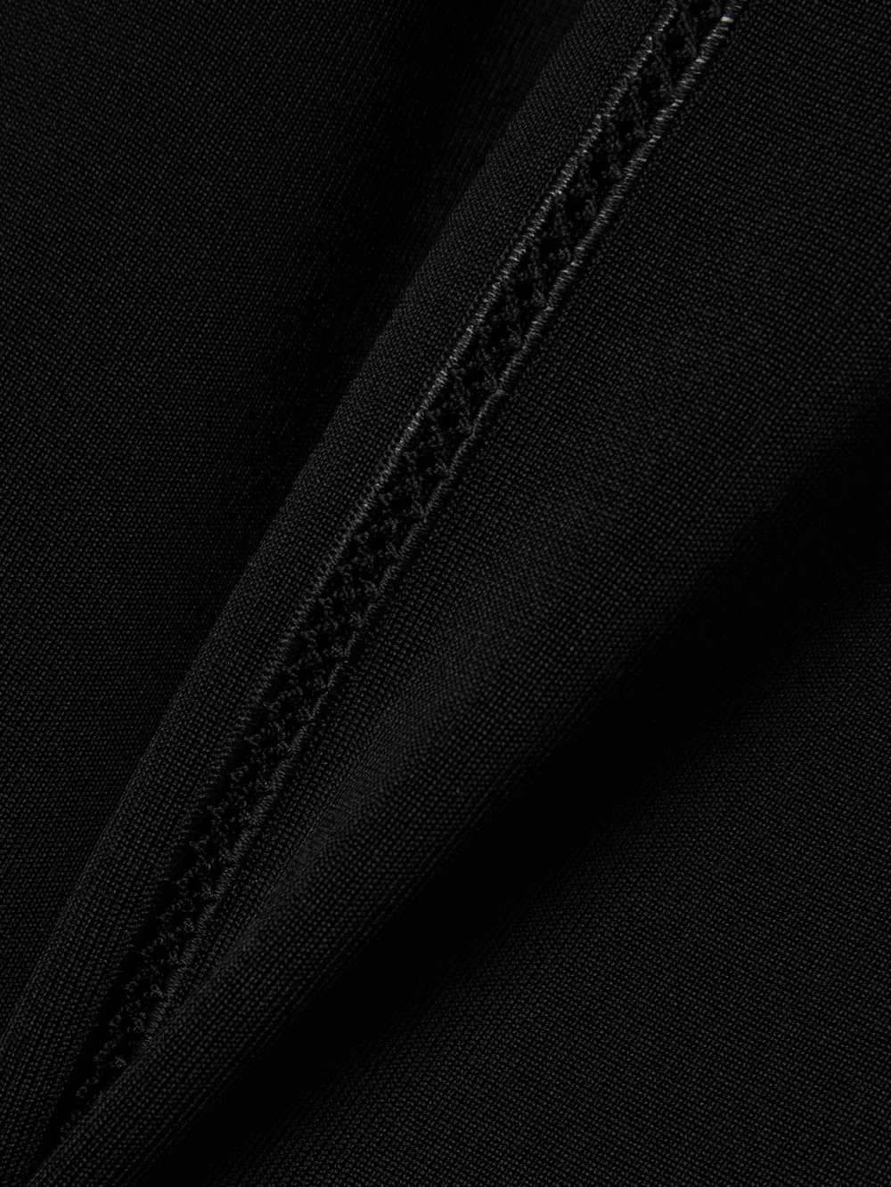 Close-up detail of the Tom Ford Knitted Midi Dress