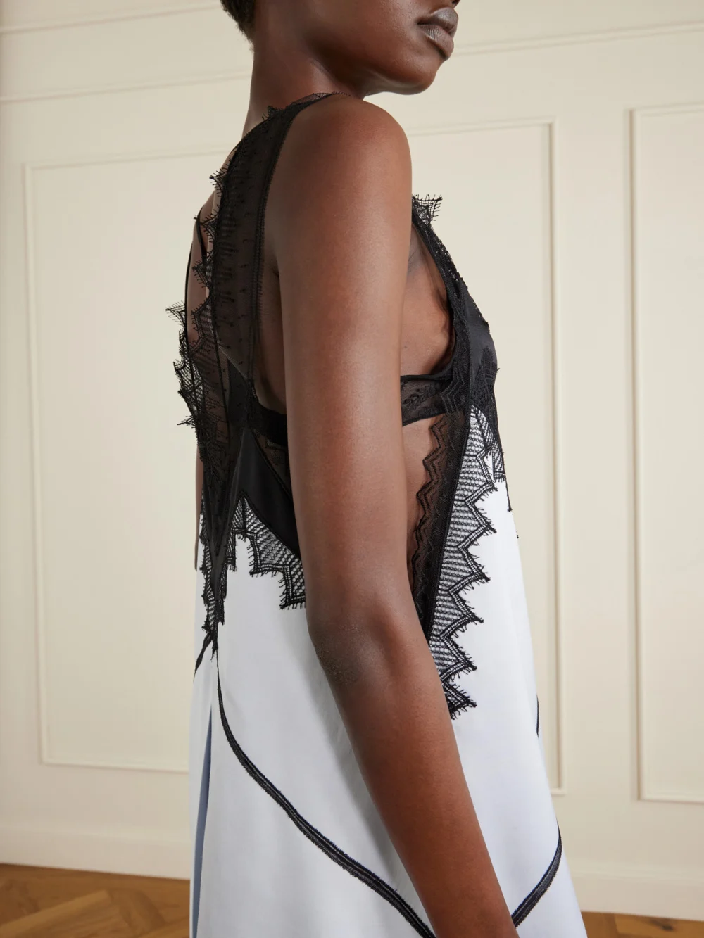 Close-up detail of the Tom Ford Lace-trimmed Wool and Silk-blend Mikado Mini Dress