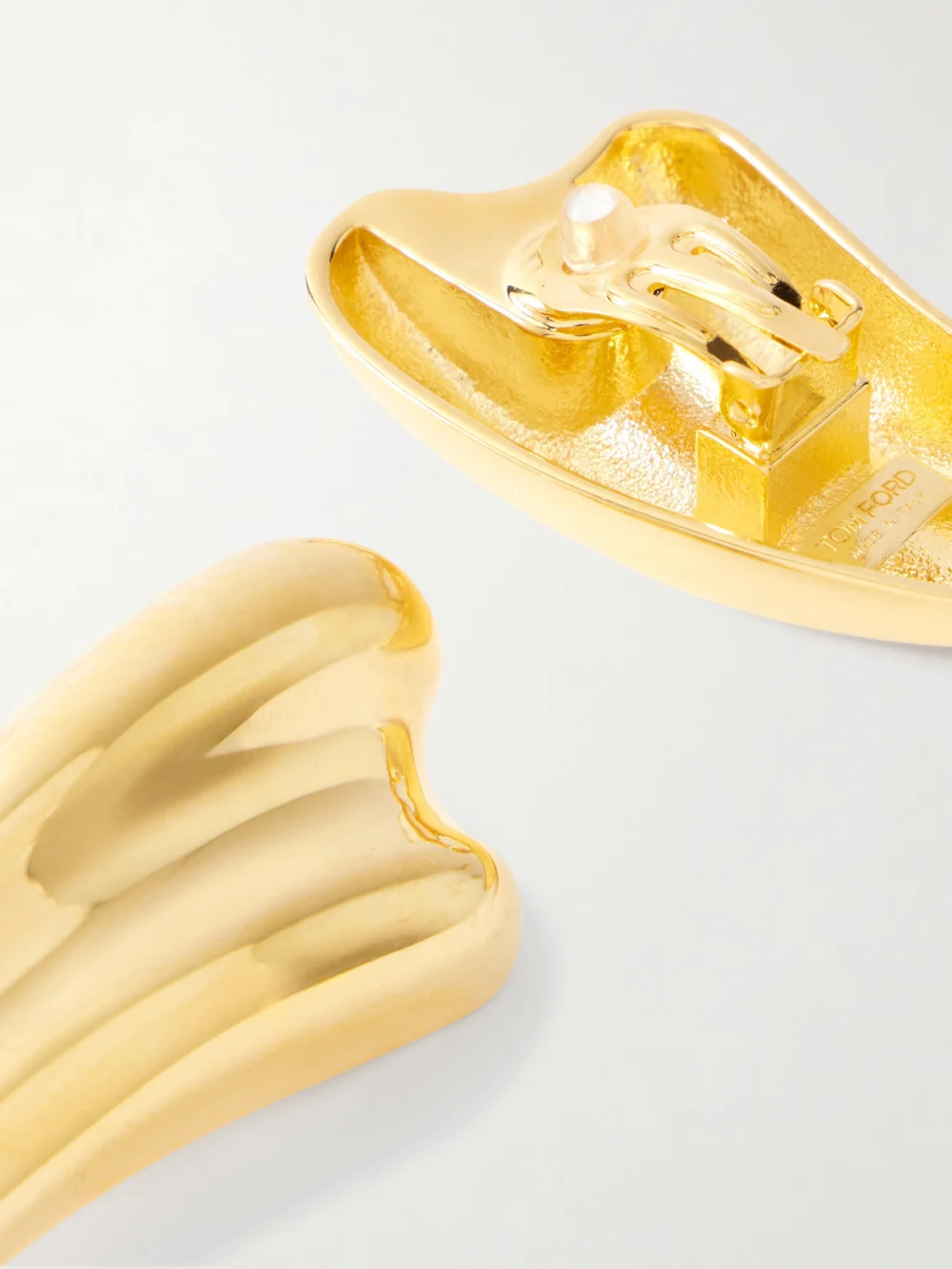 Close-up detail of the Tom Ford Liza Gold-tone Clip Earrings