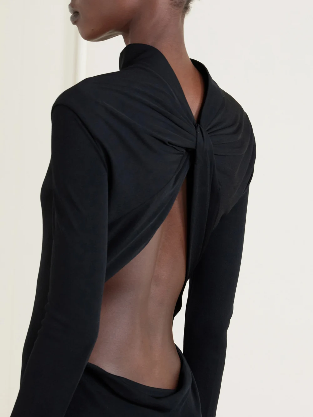 Close-up detail of the Tom Ford Open-back Crepe-jersey Gown