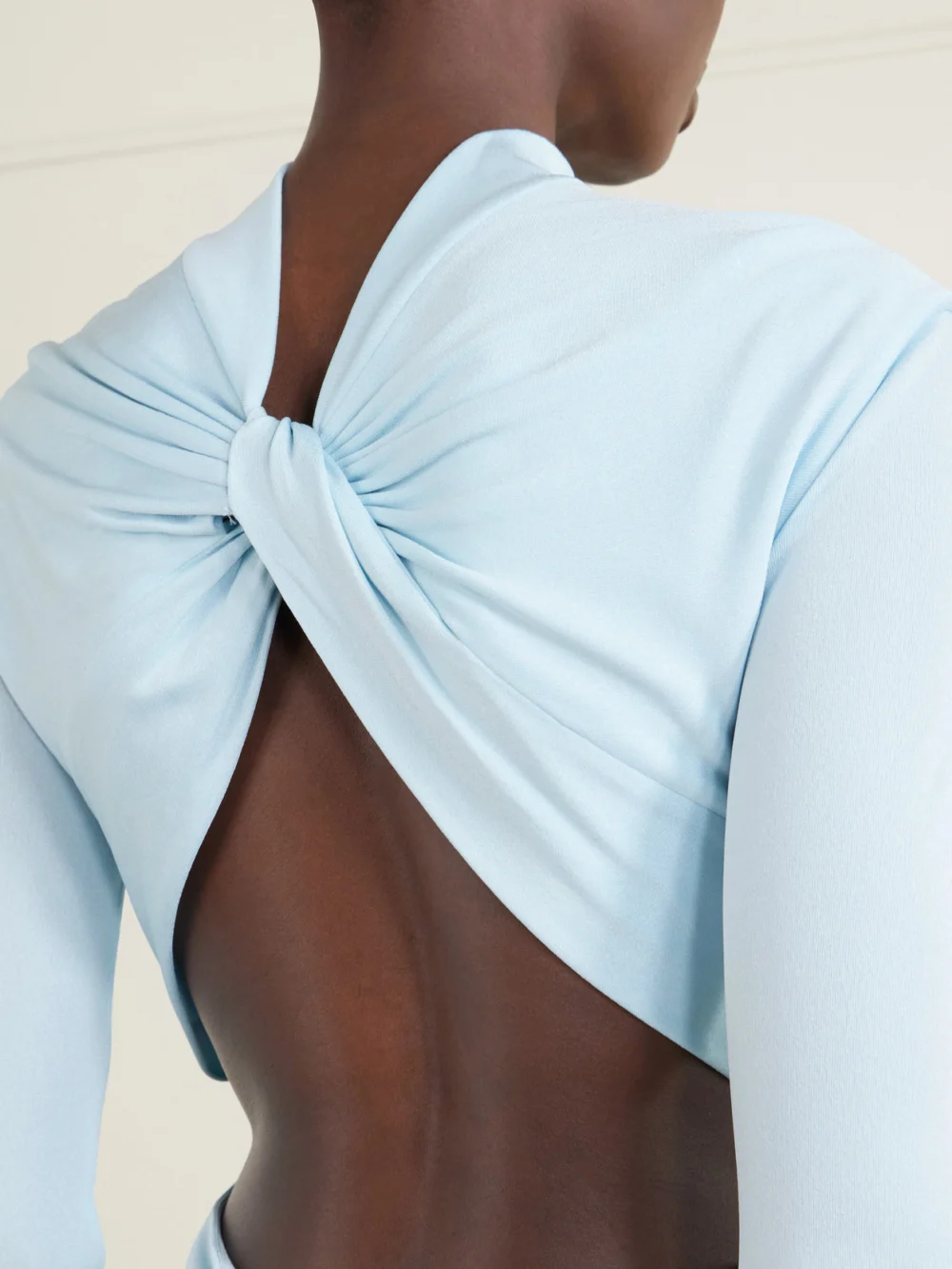 Close-up detail of the Tom Ford Open-back Crepe-jersey Gown