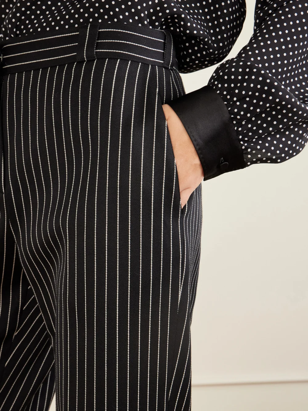 Close-up detail of the Tom Ford Pinstriped Wool and Cotton-blend Straight-leg Pants