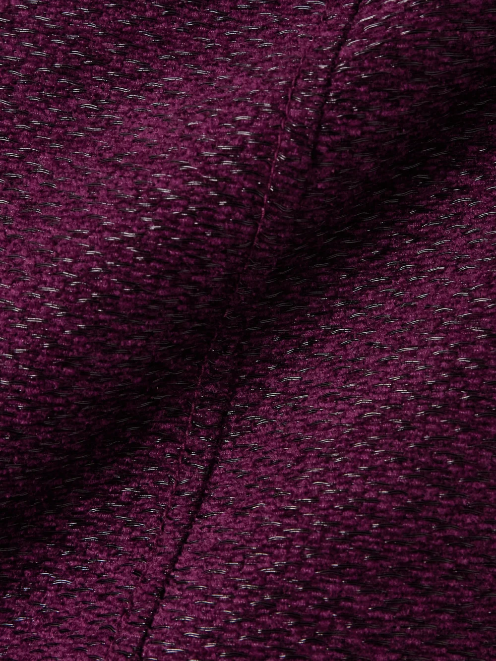 Close-up detail of the Tom Ford Pleated Metallic Tweed Mini Skirt
