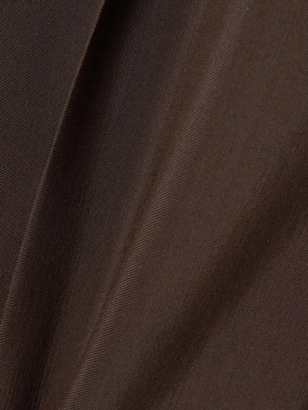 Close-up detail of the Tom Ford Pleated Washed-twill Wide-leg Pants