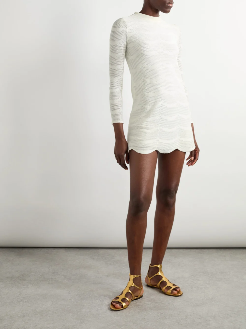 Tom Ford Pointelle-knit Cotton and Silk-blend Mini Dress, worn by a model