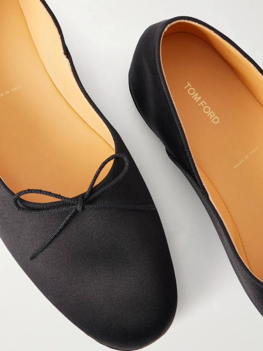 Close-up detail of the Tom Ford Satin Ballet Flats