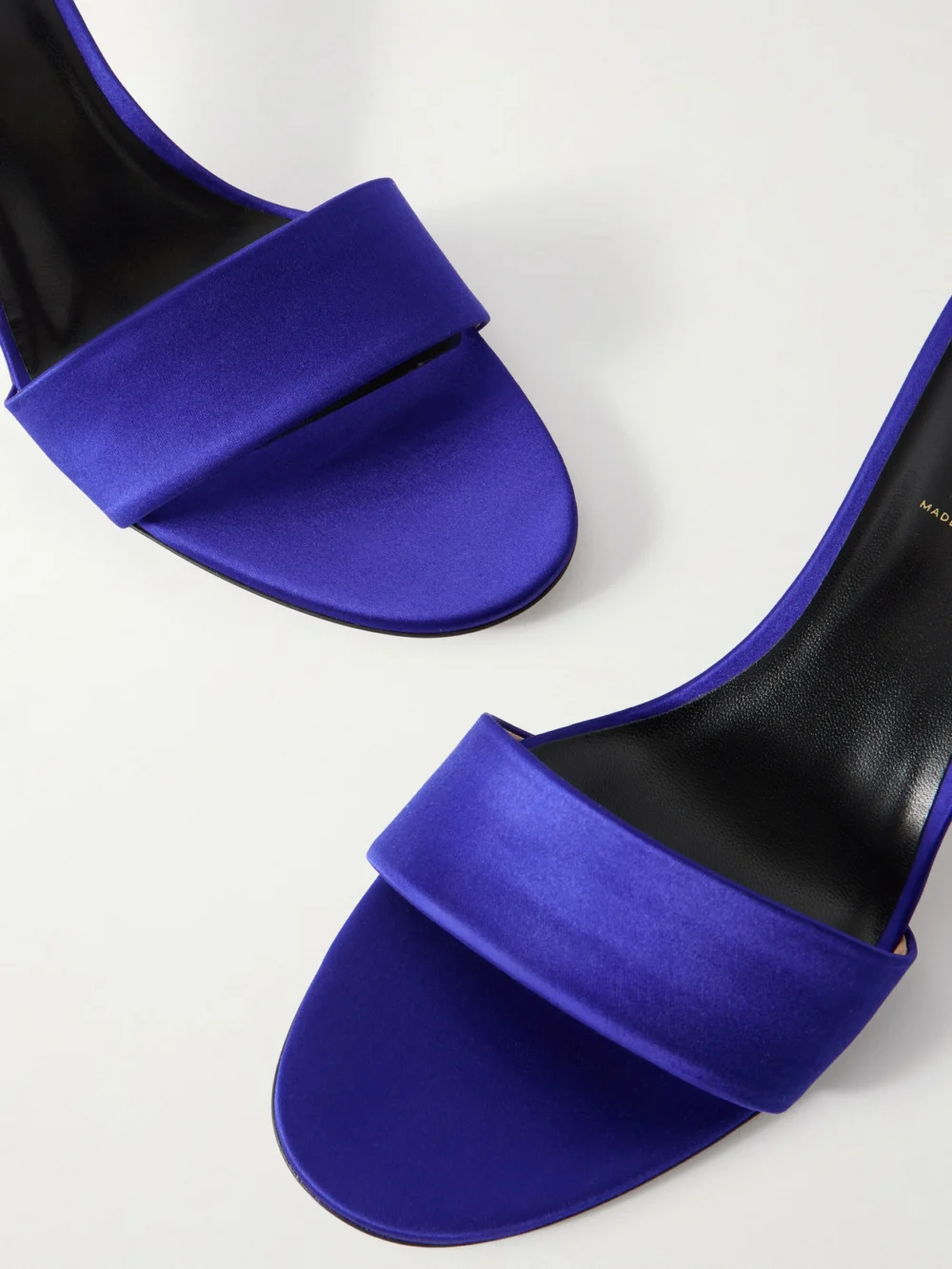 Close-up detail of the Tom Ford Satin Mules