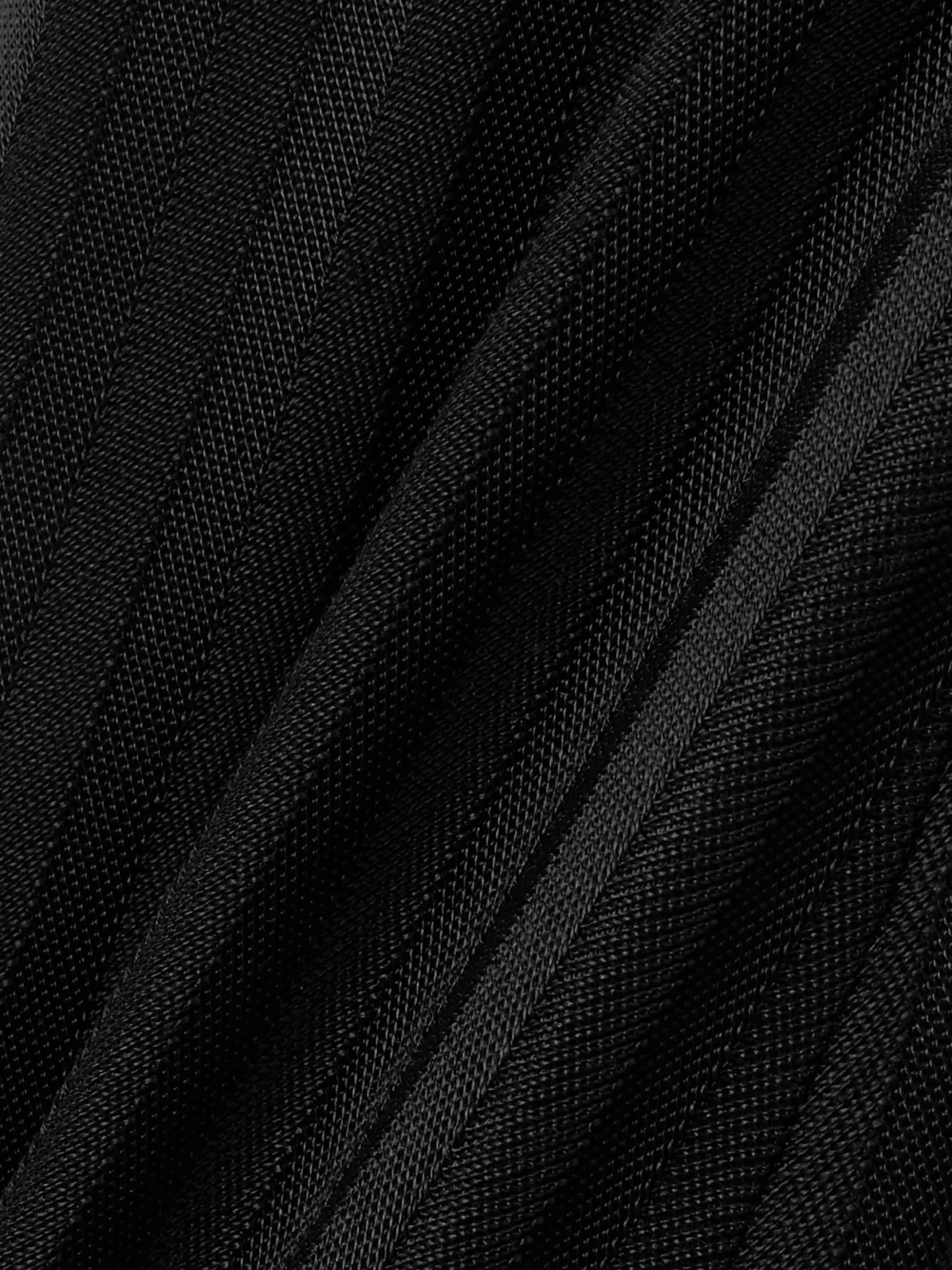 Close-up detail of the Tom Ford Striped Herringbone Jersey Flared Pants