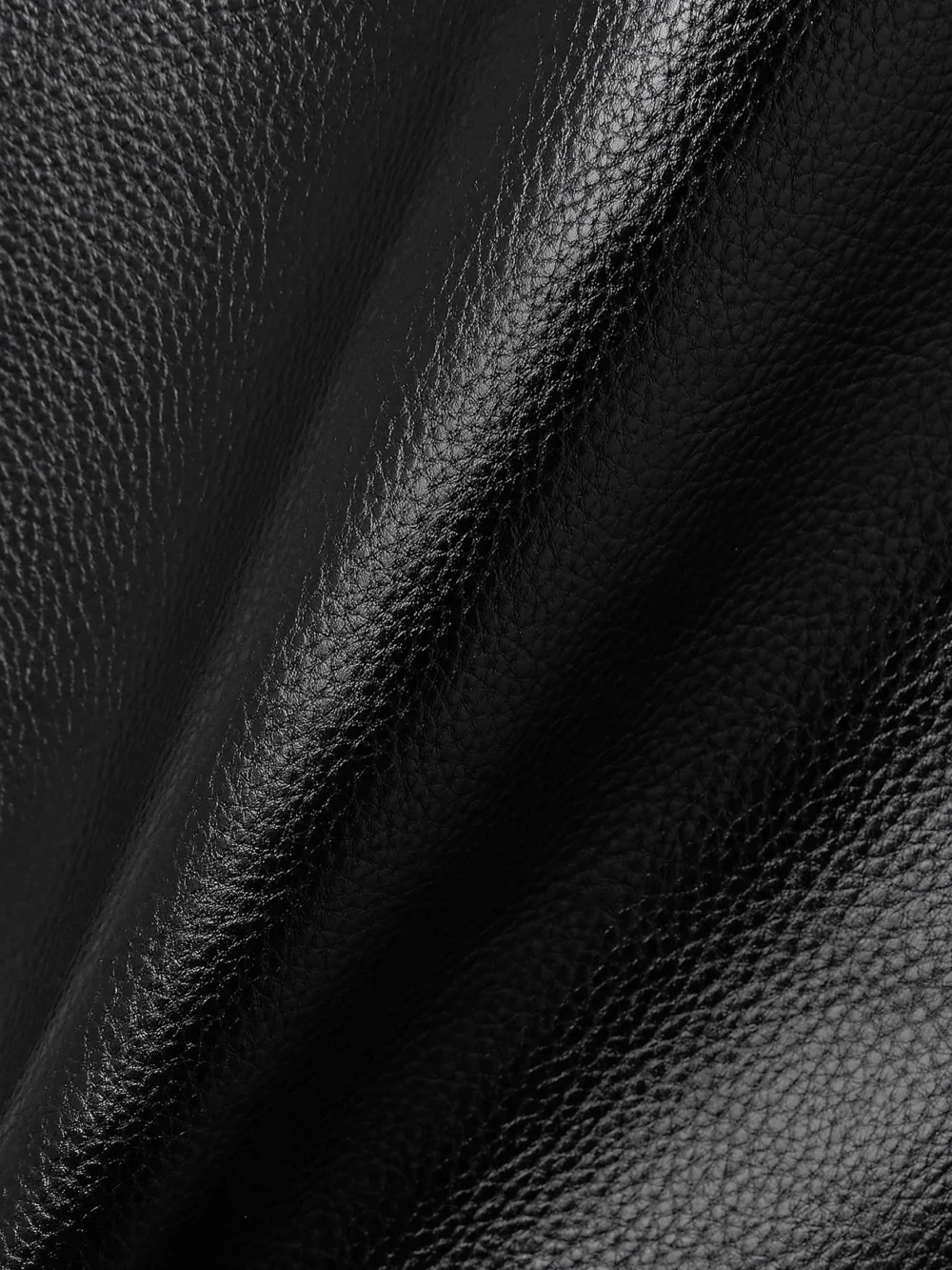 Close-up detail of the Tom Ford Zip-detailed Textured-leather Skirt