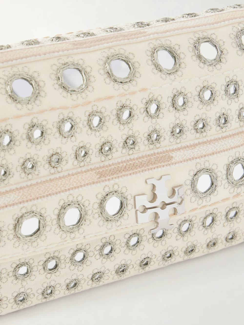Close-up detail of the Tory Burch Charlie Embellished Embroidered Canvas Shoulder Bag