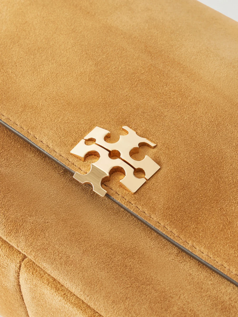Close-up detail of the Tory Burch Charlie Logo-embellished Suede Shoulder Bag