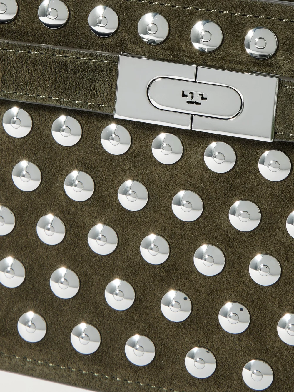 Close-up detail of the Tory Burch Lee Radziwill Mini Studded Suede Shoulder Bag