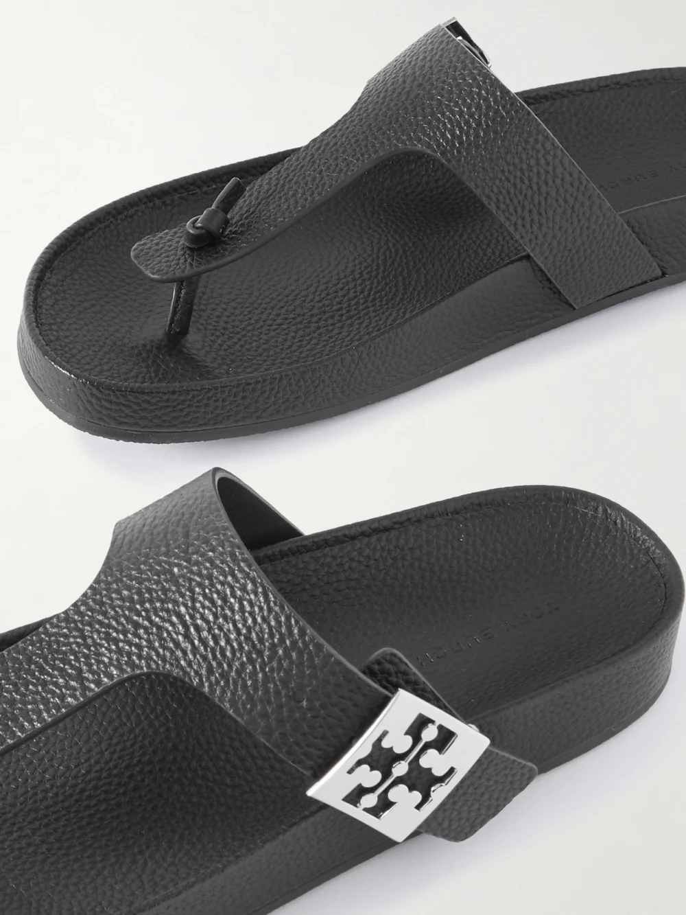Close-up detail of the Tory Burch Mellow Buckled Textured-leather Sandals