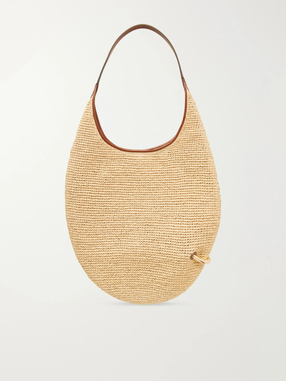 Back view of the Tory Burch Pierced Embellished Leather-trimmed Raffia Shoulder Strap