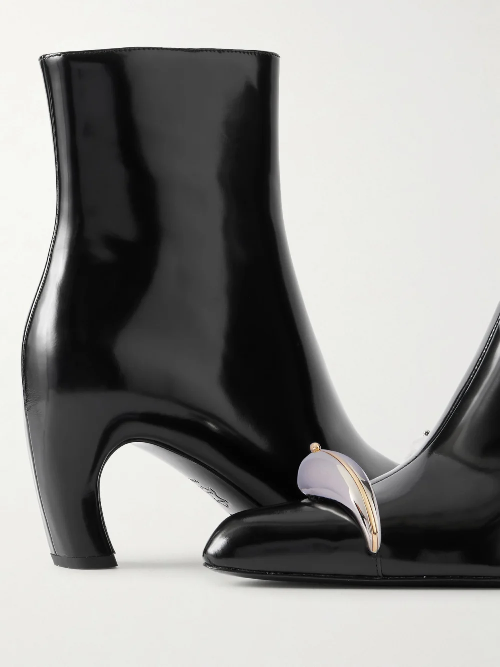 Close-up detail of the Tory Burch Pierced Xl Embellished Leather Ankle Boots