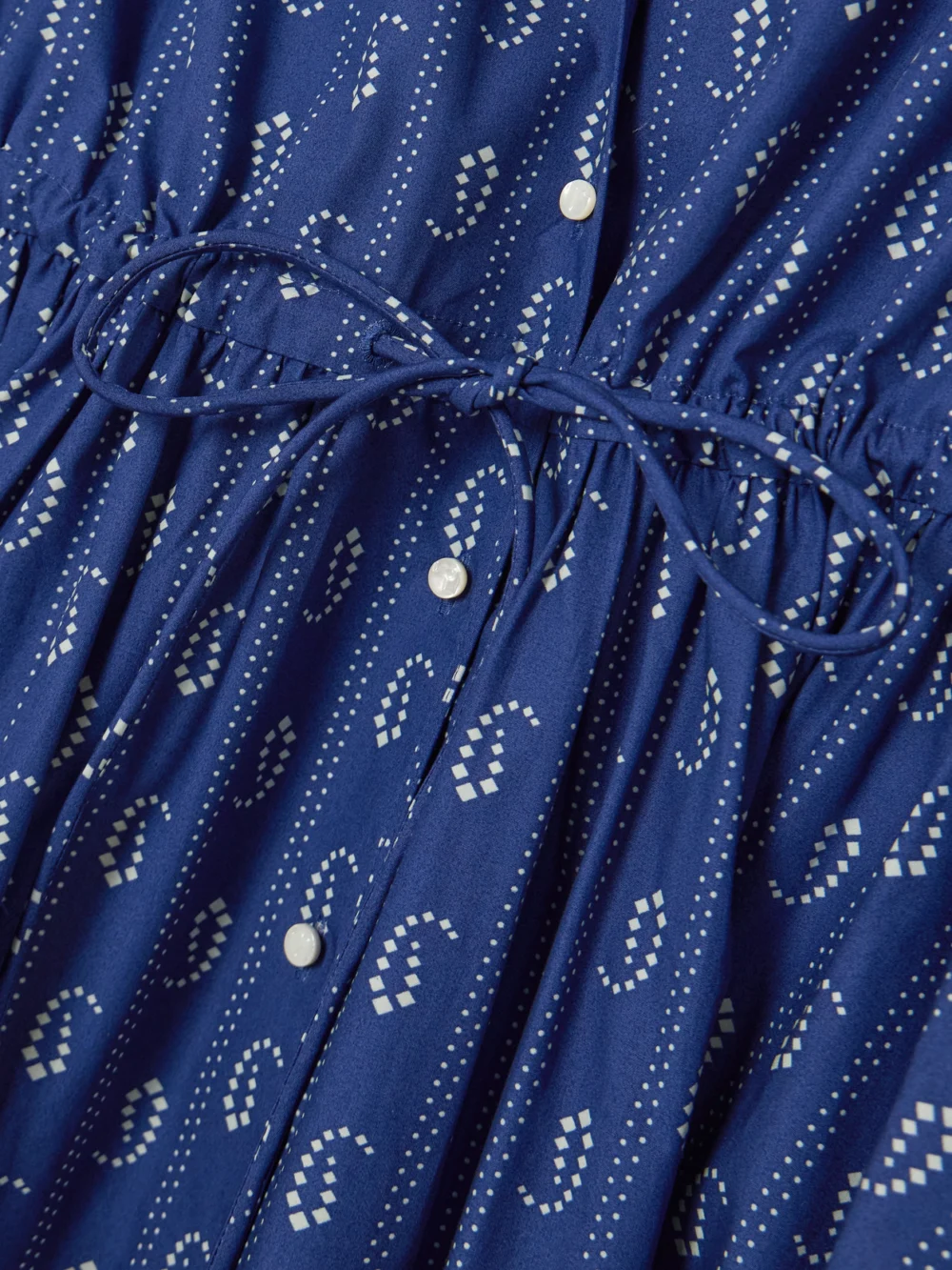 Close-up detail of the Tory Burch Printed Cotton Midi Shirt Dress