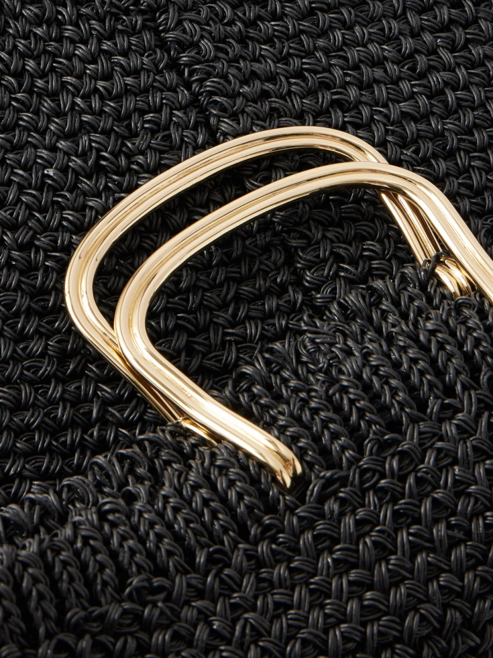 Close-up detail of the Tory Burch Woven Tote Bag