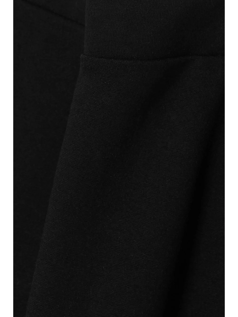 Close-up detail of the Totême Cork Stretch-jersey Leggings