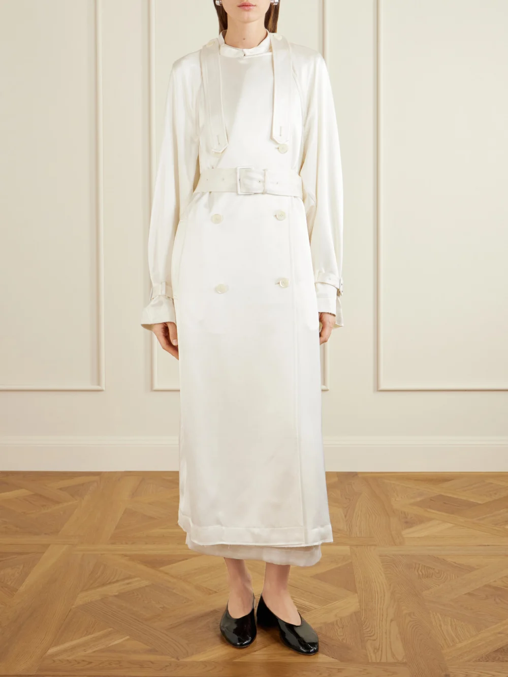 Side view of the Totême Double-breasted Draped Satin Trench Coat