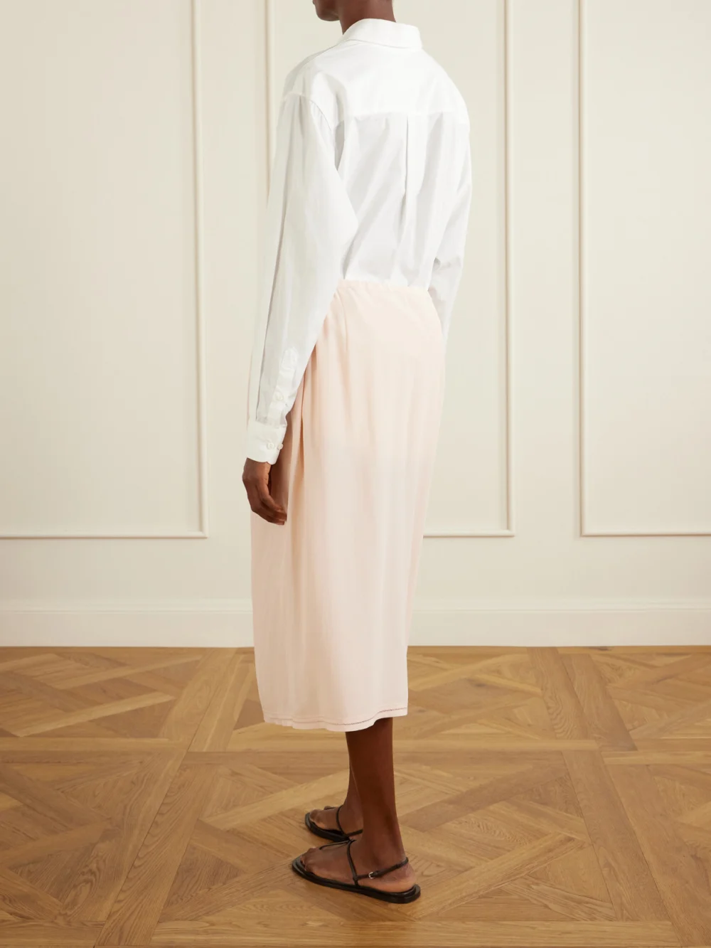 Back view of the Totême Silk Midi Skirt