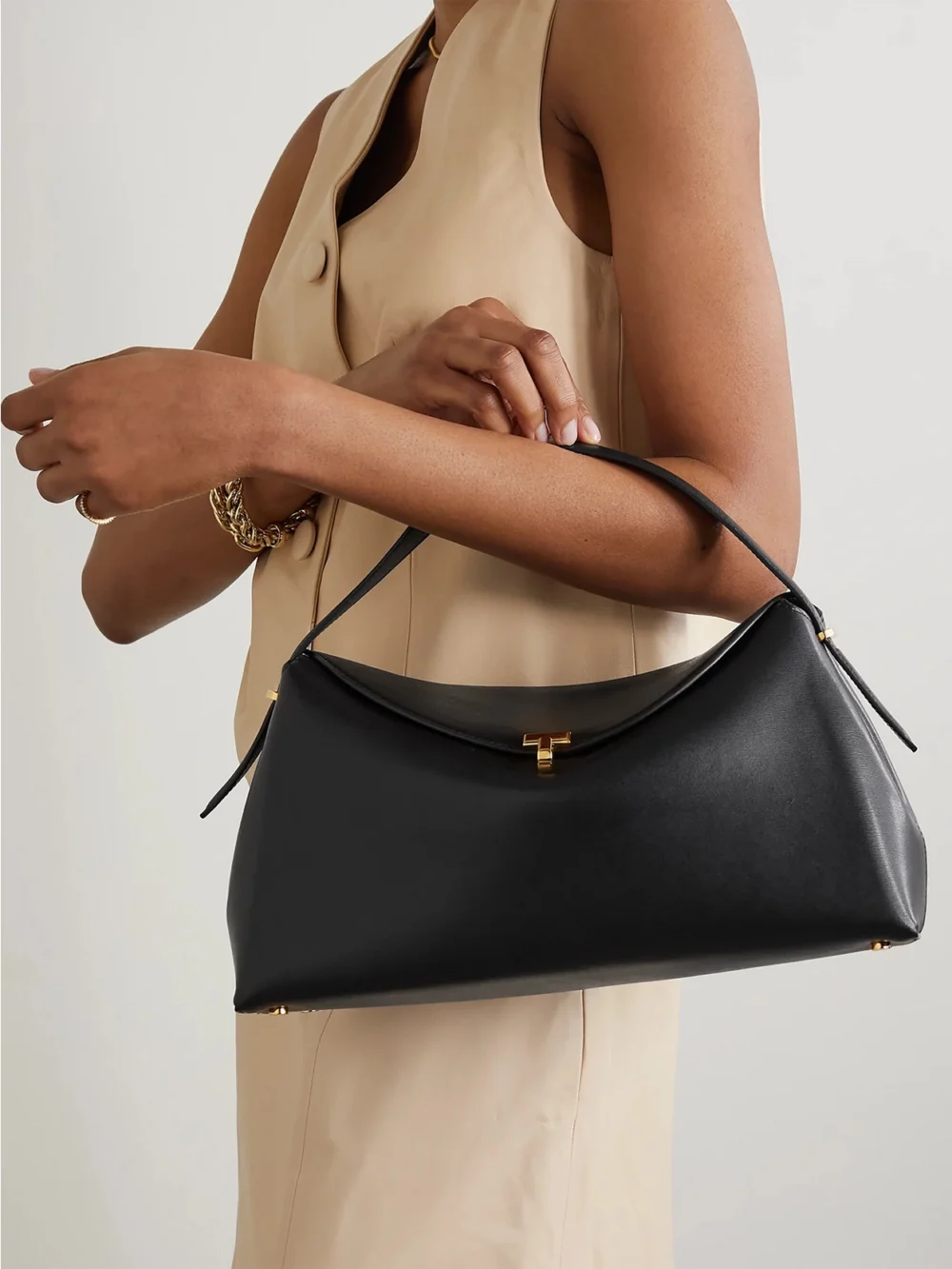 Totême T-lock Leather Shoulder Bag, styled view