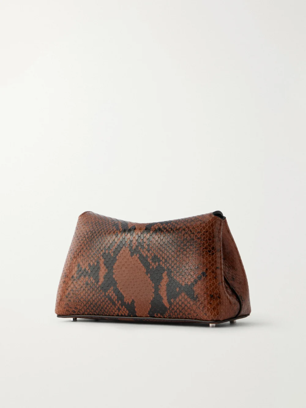 Back view of the Totême T-lock Mini Snake-effect Leather Clutch