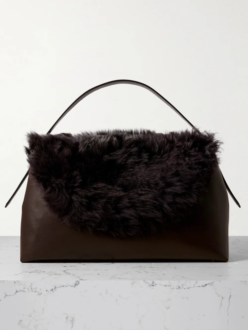 Totême T-lock Shearling Shoulder Bag in dark brown