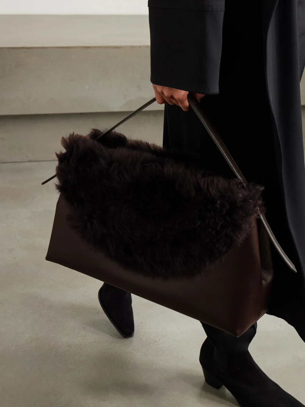 Totême T-lock Shearling Shoulder Bag, styled view