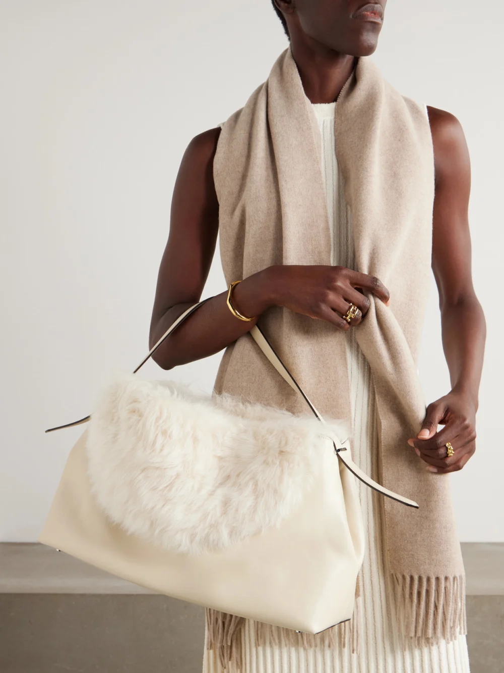 Totême T-lock Shearling Shoulder Bag, styled view