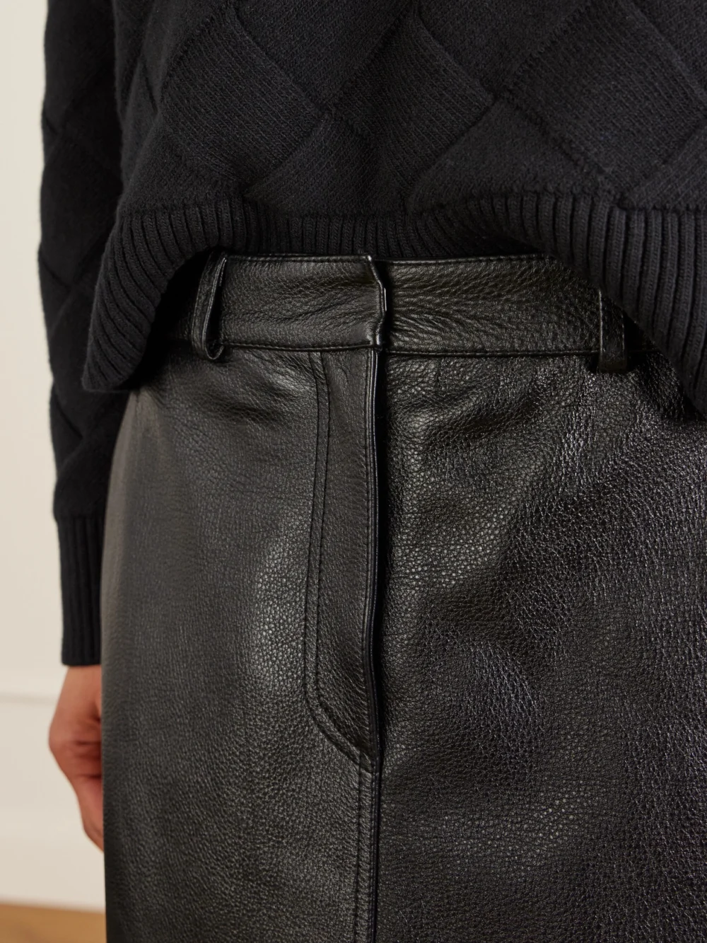 Close-up detail of the Totême Textured-leather Maxi Skirt