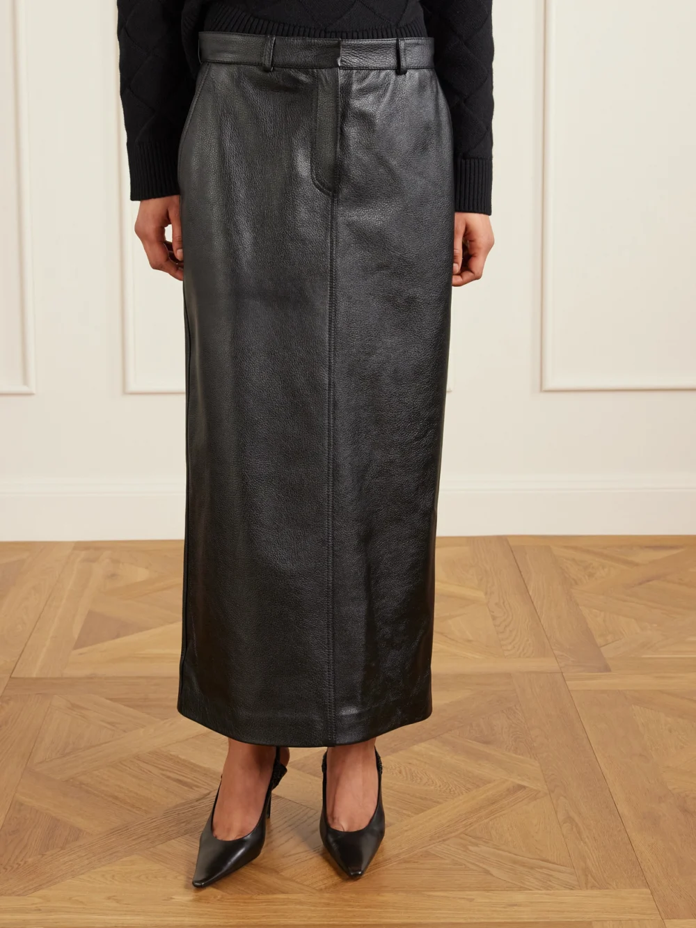 Side view of the Totême Textured-leather Maxi Skirt
