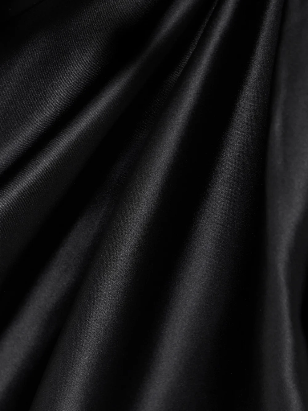 Close-up detail of the Tove Aubree Ruched Silk-satin Midi Dress