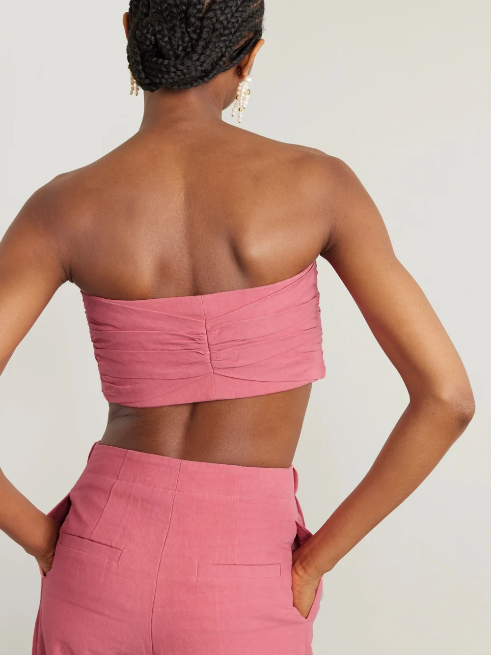 Back view of the Tove Awa Cropped Tie-front Gathered Stretch Linen and Cotton-blend Top