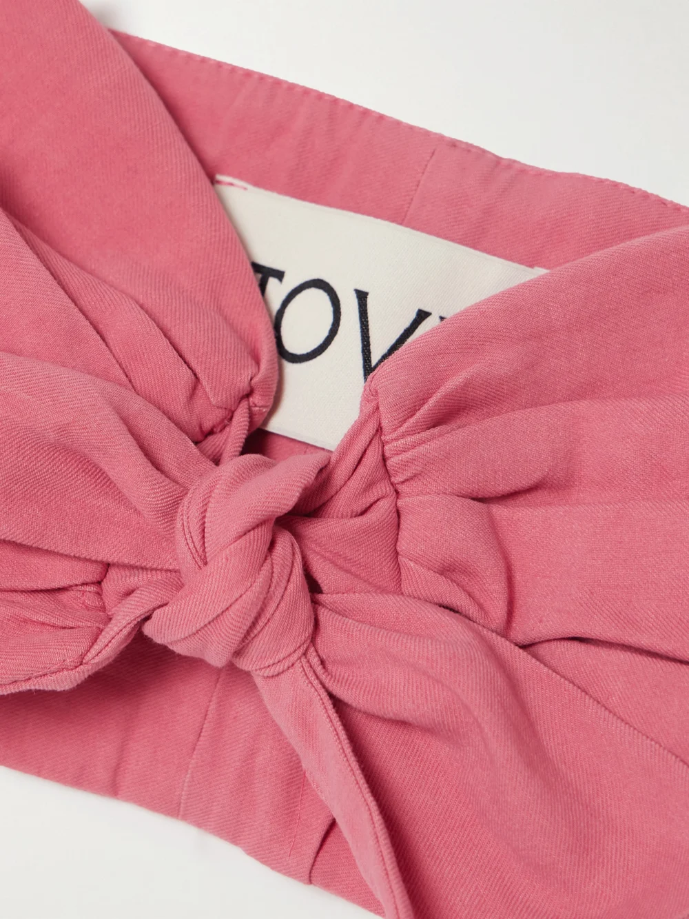 Close-up detail of the Tove Awa Cropped Tie-front Gathered Stretch Linen and Cotton-blend Top