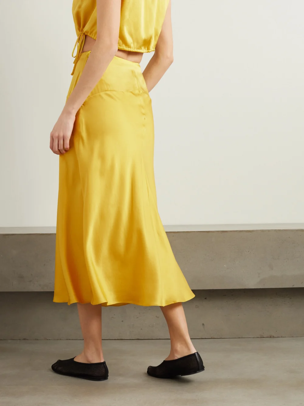 Back view of the Tove Clover Silk-satin Midi Skirt