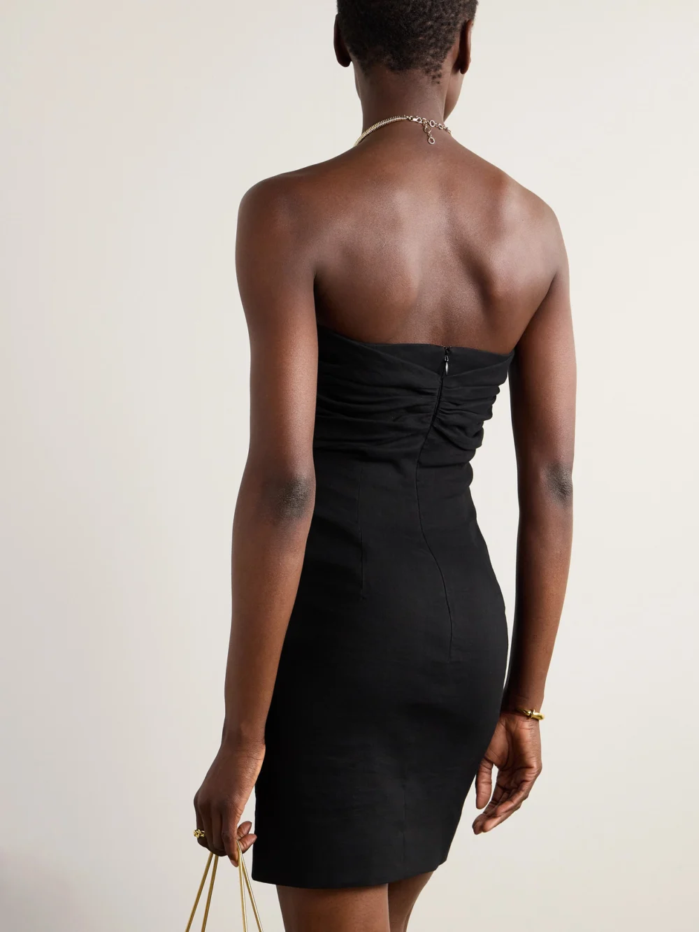 Back view of the Tove Dipti Strapless Tie-front Stretch Linen and Cotton-blend Mini Dress